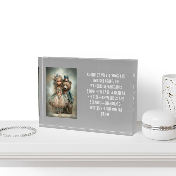 Framed artwork with text and a decorative item on a white surface